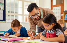Male teacher with young students