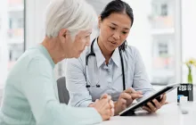 Doctor with older patient