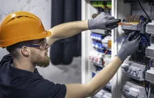 Male electrician at work