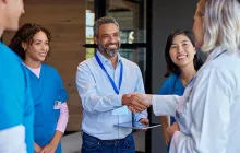 Health care workers in conversation