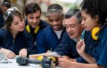 Factory workers with supervisor