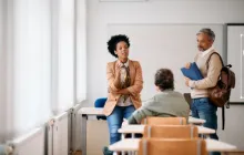 Teacher talking to students in the classroom