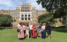 CS-SPARK team in front of school