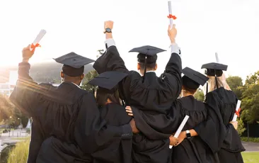 High school graduates looking into the sunshine