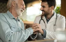 Rural doctor with older patient